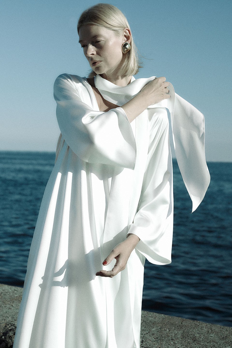 White silk dress with a scarf