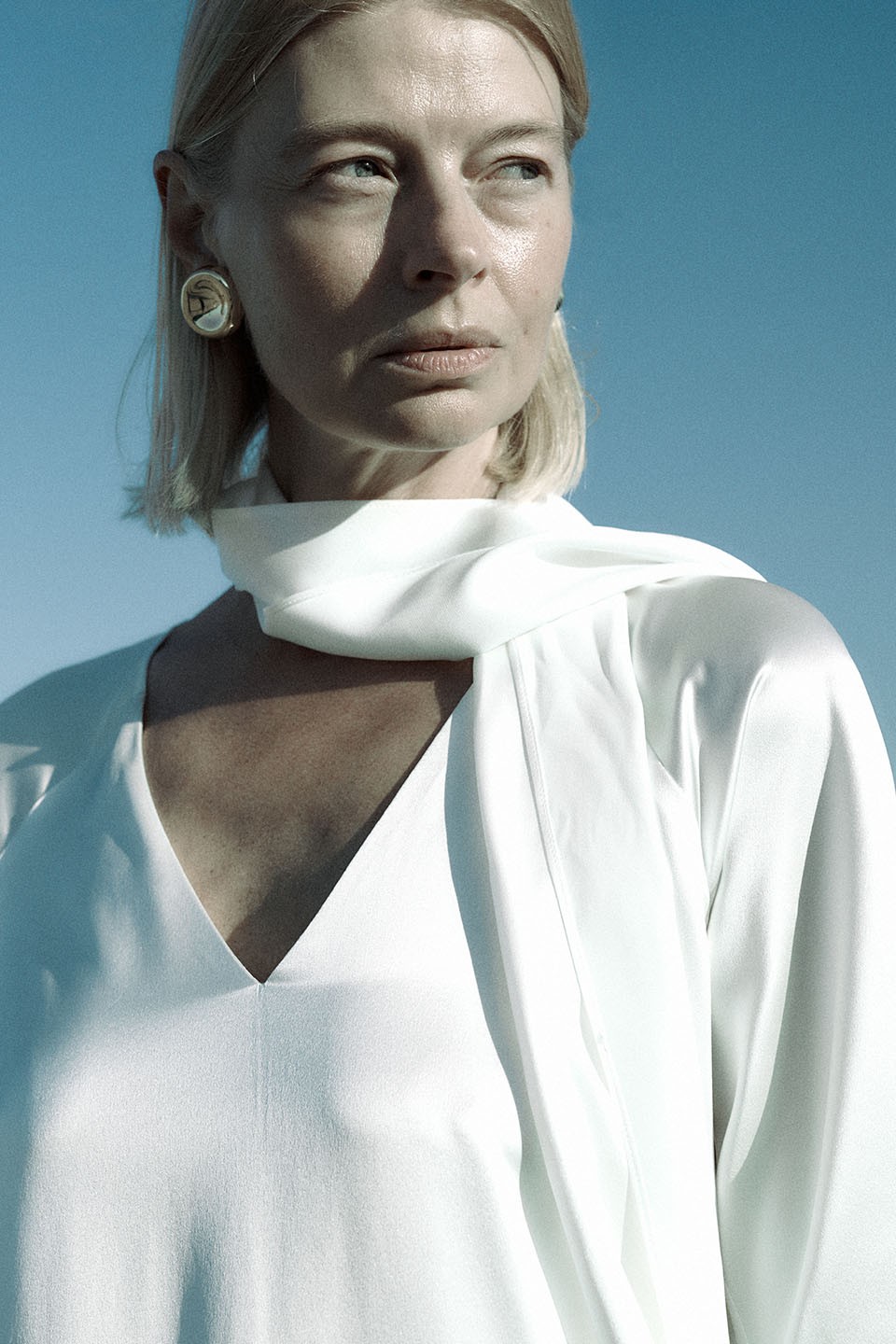 White silk dress with a scarf